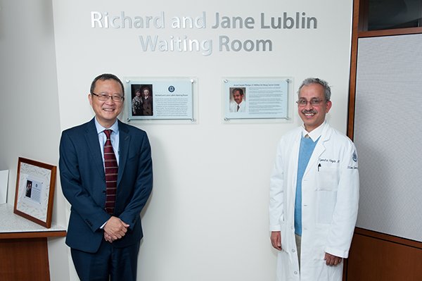 Bruce Liang, MD, dean of the School of Medicine, and Upendra Hegde, MD, co-director of the head and neck/oral oncology program.