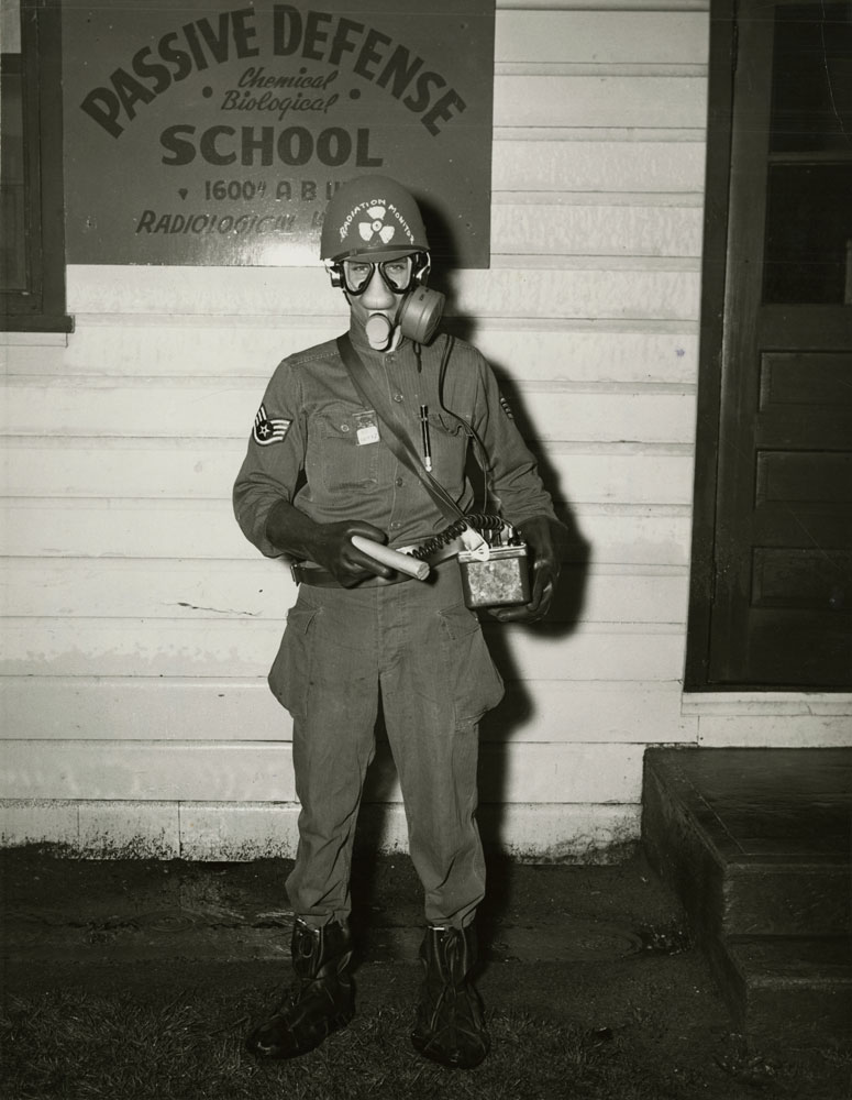 mystery photo of a student wearing a gas mask
