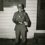 mystery photo of a student wearing a gas mask